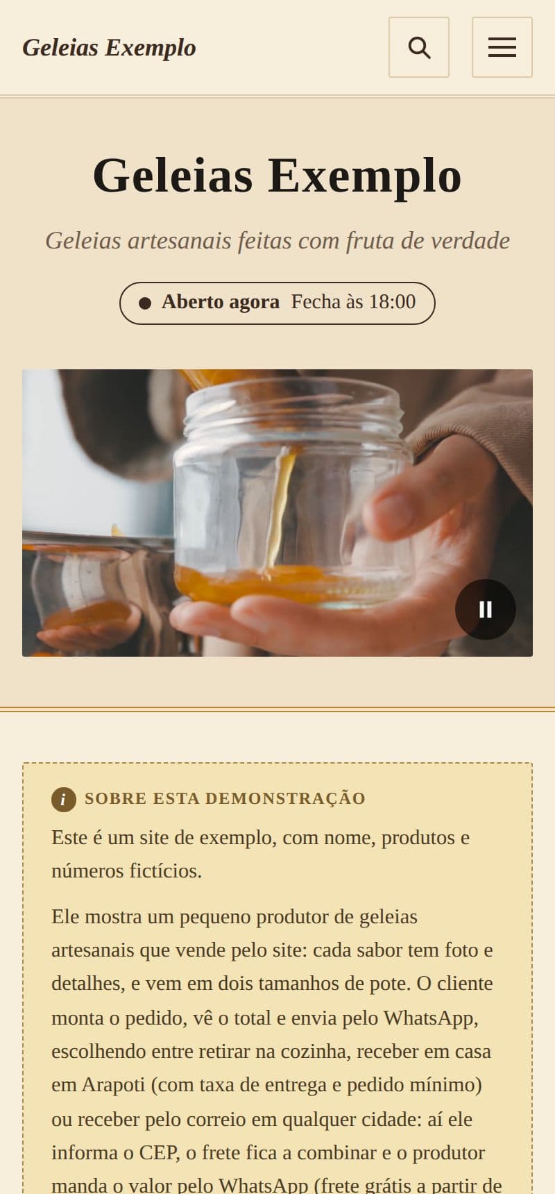O vídeo no topo do site das geleias de exemplo, com o botão de pausa